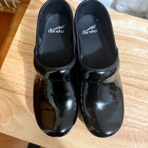 Dansko Women's Black Patent Clogs